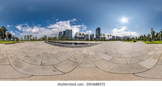 360 seamless hdri panorama view on square near seashore or ocean with skyscrapers with blue sky and good weather in equirectangular spherical projection, ready AR VR virtual reality content