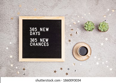 365 new days, 365 new chances. Letter board with motivational quote on grey concrete background with coffee cup. New year resolutions and goal setting, self improvement and development concept.  - Shutterstock ID 1860093034