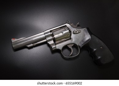  .38 Caliber Revolver Pistol  In Black Background