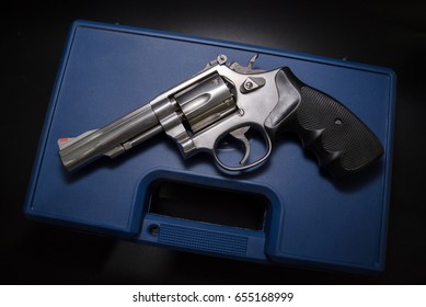 .38 Caliber Revolver Pistol  On Blue Gun Box