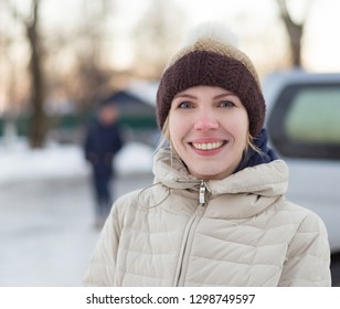 38 Years Old Woman In A Hat With A Pompon In Winter