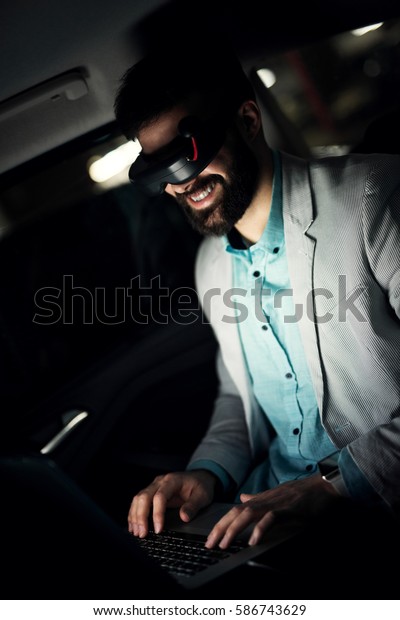 3D glasses business\
concept in the car virtual reality, finishing job on time. Future\
business technology. 
