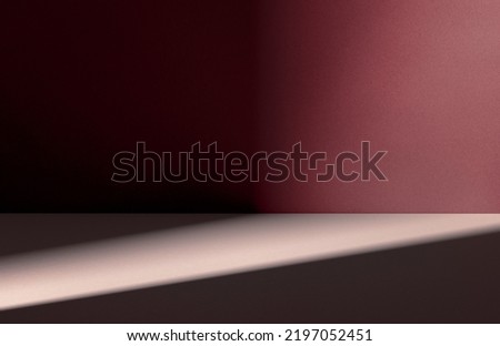 3D Illustration. Light color base and red wall lit by spotlight as place for displaying your product. Computer rendering product background.