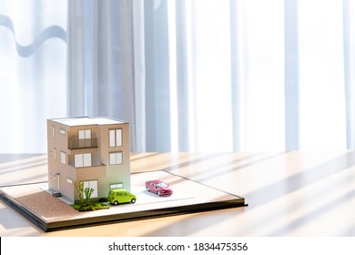 3D model of a house on a table (real estate image)
