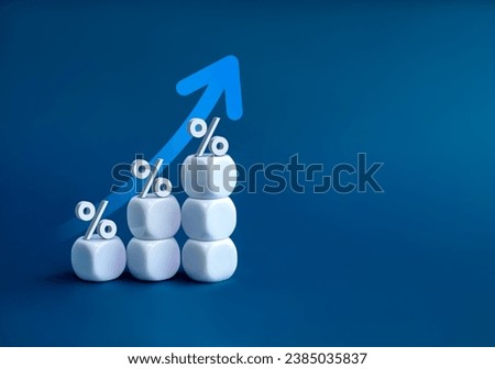 3d Percentage icon on white cube blocks as a business chart steps with rise up arrow isolated on blue background with copy space. Business growth graph process and economic improvement concepts.