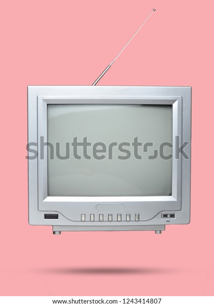 3d photo of Retro tube TV\
on pink pastel background. Top view, vintage video technology\,\
minimalism