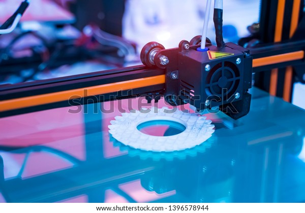 3D printer or additive manufacturing and\
robotic automation\
technology.