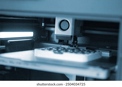 3D printer close up. A working 3D printer in process of printing object from molten plastic. 3D printer creating model by flowing liquid plastic from an extruder of printer. 3D printing technology - Powered by Shutterstock - Get 15% off with code: PIKWIZARD15