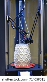 3d the printer creates a figure in the form of a white vase close-up. Progressive modern additive technologies 4.0 industrial revolution