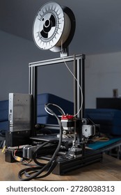 3D printer creates a plastic prototype using additive manufacturing in a professional workspace with emphasis on precision technology.