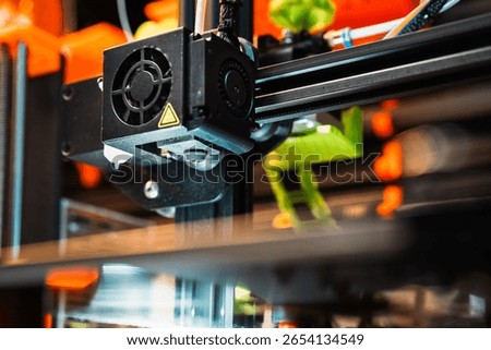 3d printer extruder header nozzle factory workshop dark background