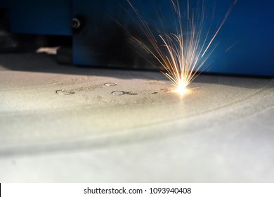 3D printer printing metal. Laser sintering machine for metal. Metal is sintered under the action of laser into shape. DMLS, SLM, SLS. Modern additive technologies 4.0 industrial revolution. Sparks