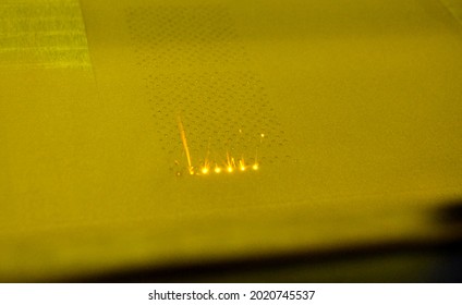 3D printer printing three-dimensional object from metal powder.