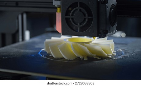 A 3D printer is producing a plastic prototype using additive manufacturing. - Powered by Shutterstock - Get 15% off with code: PIKWIZARD15