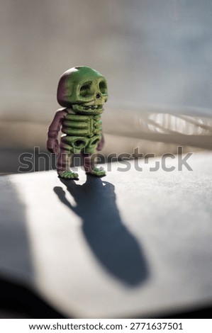 3D printer. The skeleton toy is created on a 3D printer. High-precision 3D printing technologies. Creation of three-dimensional models. Modern innovative additive technologies. An artistic object.