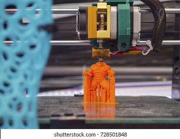 3D Printing Of Toy With Extrusion Of Recycled Plastic Waste. Closeup. Selective Focus