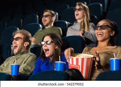 3D Reality. People Wearing 3D Glasses Screaming While Watching A Movie At The Local Cinema Weekend Premiere 3D Technology Shocked Surprised Scream Entertainment Activity Concept