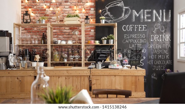 3d render of cafe bar restaurant nobody indoor. Empty coffee shop interior daytime with wooden design counter red brick wall in background. menu writing on blackboard with beautiful letters and cup.