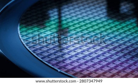 3D Render: Computer Chip Manufacturing. Close-up of Colorful Semiconductor Wafer that is just was Diced during Microchip Packaging Process. Silicon Dies are being Extracted by a Pick and Place Machine