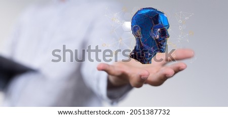A 3d rendering of a blue Human head with network plexus structure in a male hand with a white background