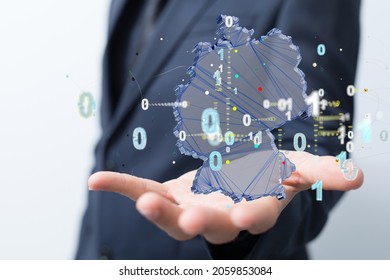 A 3D rendering of digital Germany map floating on human hand- internet and global connection concept