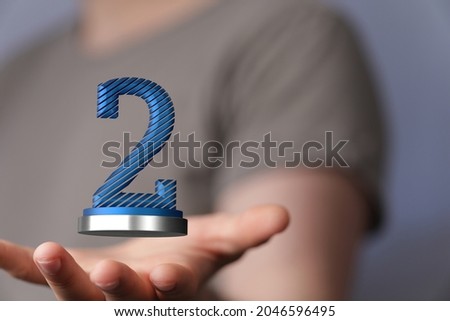 A 3D rendering of a digital number 2 on human hands- concept for 2nd place or 2nd year anniversary