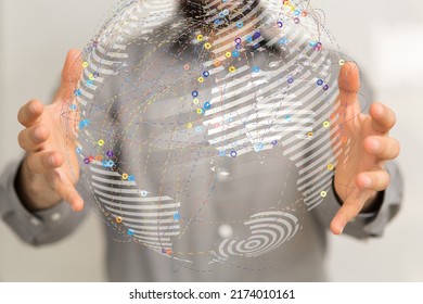 A 3D rendering of global digital data hologram between a businessman's palms