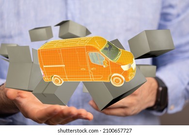 A 3D rendering of a hologram wireframe van in a man's hands - logistics and delivery concept - Powered by Shutterstock