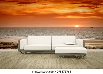 3D rendering of a sofa in front of a photo wall mural ocean sunset