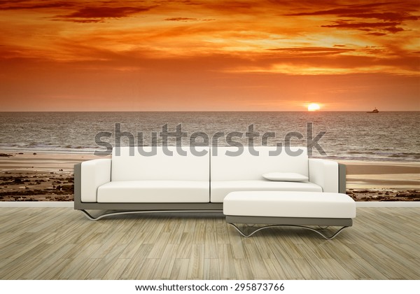 3D rendering of a living room sofa in front of a photo wall mural ocean sunset.