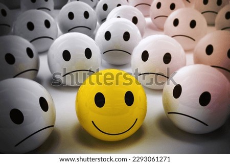 3D Rendering yellow ball with smiley face among so many white sad balls. happy leader supports his negative team