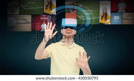 3d technology, virtual reality, cyberspace, entertainment and people concept - happy young man with virtual reality headset or 3d glasses networking over black background