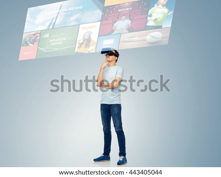 3d technology, virtual reality, entertainment, cyberspace and people concept - happy young man with virtual reality headset or 3d glasses thinking and looking at screen with internet news