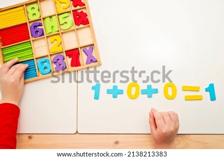 3D wooden numbers. Implement for learning to count with help of digits, and additional visual sources. Addition and subtraction exercises. Montessori methodology for nursery and preschool children.