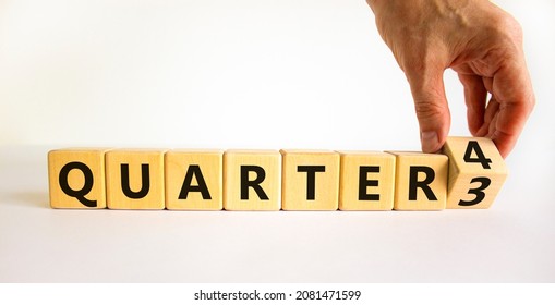 From 3rd To 4th Quarter Symbol. Businessman Turns A Cube And Changes Words 'quarter 3' To 'quarter 4'. Beautiful White Table, White Background. Business, Happy 4th Quarter Concept, Copy Space.