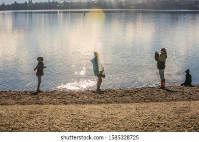 3rd May 2019,Wanaka,New Zealand. Children Playing Activity Around The Famous Willow Tree Located At Wanaka Lake Shore.The Willow Tree Also Well-known As 