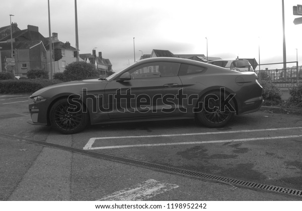 3rd October 2018-\
A stylish Ford Mustang in a town carpark at Carmarthen,\
Carmarthenshire, Wales, UK.