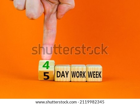 4 or 5 day work week symbol. Businessman turns cubes and changes words 5 day work week to 4 day work week. Beautiful orange background. Copy space. Business and 4 or 5 day work week concept.