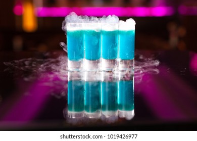 4 Blue Kamikaze Shot Cocktail With Smoke