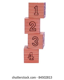 4 Building Blocks With The Numbers 1 2 3 And 4 Showing Forward