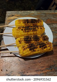 4 Grilled Corn Cob On The White Plate