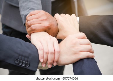4 Hand Assemble Corporate Meeting /Teamwork