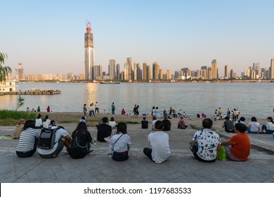 4 October 2018, Wuhan China : China Golden Week - Chinese Tourists Enjoying Yangtze River Bank And View On Wuhan Skyline