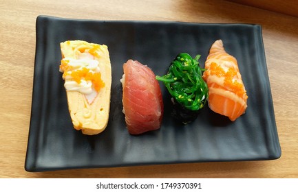 4 Pieces Of Sushi On A Plate