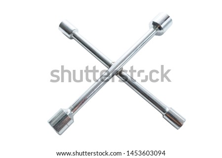 4 way wrench on isolated white background.