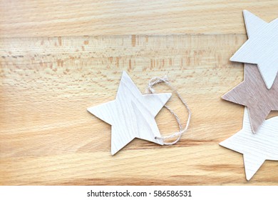 4 Wooden Star On The Wooden Background. Bright Image. It Can Be Used For The Laser Engraving, And Wood Processing.