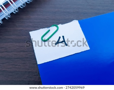 4 writting on table background. 