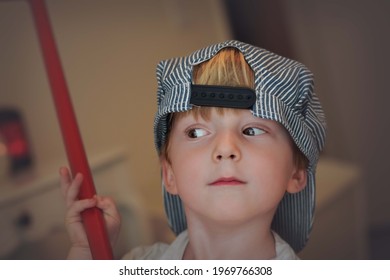 4 Year Old Boy In Train Conductor Hat