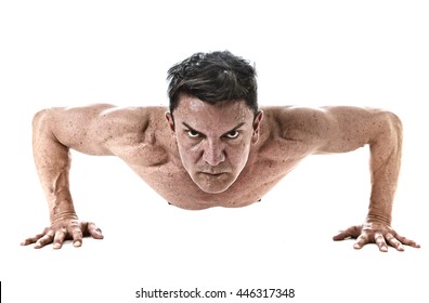 40 To 45 Years Old Attractive Fit Man Doing Push Up Workout Training Hard  Fitness Routine With Strong And Muscular Body Isolated On White Background In Health Sport And Bodybuilding Concept