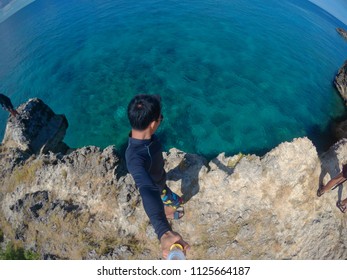 40 Feet Cliff Dive On A 10 Feet Clear Sea Water.